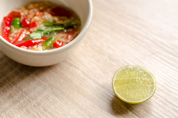 Thai spicy seafood dipping sauce on wooden background