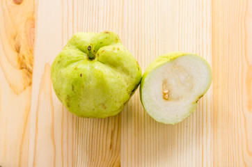 The tropical fruit high vitamin c, fresh guavas on wood backgrou