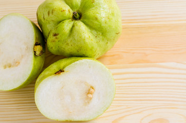 The tropical fruit high vitamin c, fresh guavas on wood backgrou