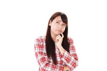 Fototapeta premium 悩む女性