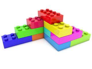 Corner of toy bricks in various colors