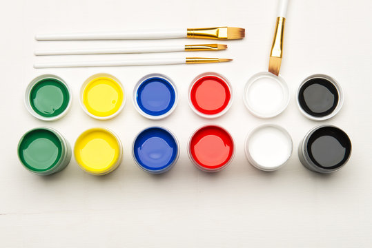 Set of paint and supplies on a white background