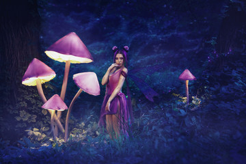 Fantastic photo shoot.  Fairy Coquette standing near the huge mushroom. Background fairy forest,...