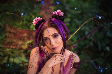  Fairy Coquette standing near the huge mushroom. Portrait, fairy looks into the camera  her huge,...