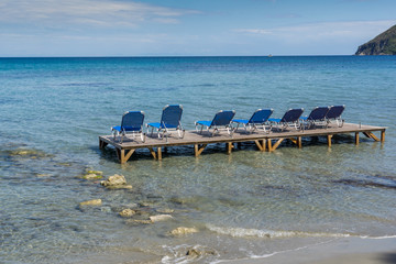 sunbeds in the water, koukla beach, Zakynthos island, Greece