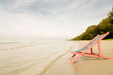 Fototapeta premium Pink beach chair