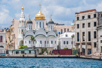 Fototapeta na wymiar White orthodox church on the seaside in Havana, Cuba