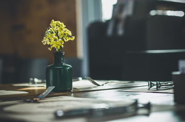vase of yellow flowers