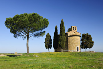 Fototapeta na wymiar Cappella della Madonna di Vitaleta, Typical Tuscany Landscape with Cypress Trees, Siena Province, Italy
