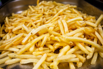 French fries on a metal plate