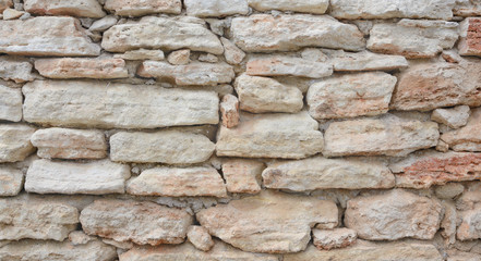 Wall from light-beige stones