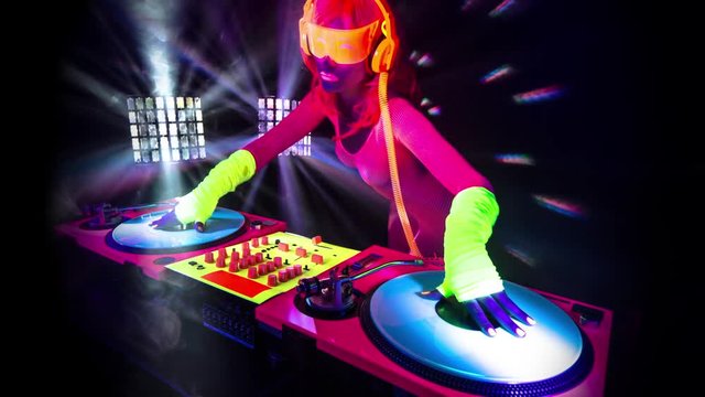 sexy DJ mixes in UV fluorescent costume