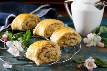 Georgian puff pastry stuffed with Gata on a wooden background. E