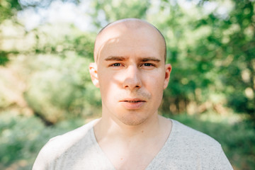 portrait bald man with Outdoors