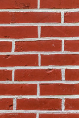 pattern of red painted brick wall