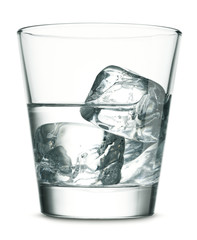 Glass of vodka with ice on white background
