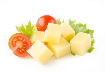 cheese cubes with tomatoes isolated on white background