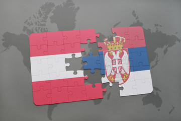 puzzle with the national flag of austria and serbia on a world map background.