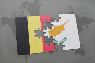 puzzle with the national flag of belgium and cyprus on a world map background.