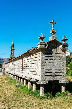 Horreo de Carnota against a clear blue sky