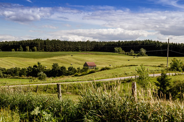 Fototapeta premium hay field landscape blue sky quebec canada