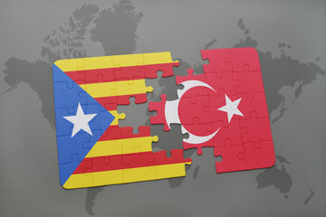 puzzle with the national flag of catalonia and turkey on a world map background.