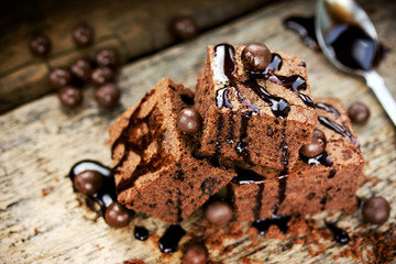 Homemade chocolate brownies on dark background