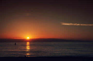 Fototapeta premium The sea and beach at sunset