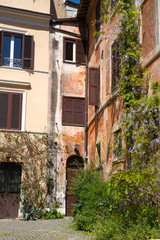 Fototapeta na wymiar ROME, ITALY - APRIL 8, 2016: Houses of Rome, italian property in the centre of the city