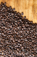 Coffee beans wooden background