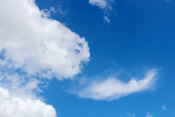 Naklejka na ściany i meble Beautiful white clouds with blue sky background