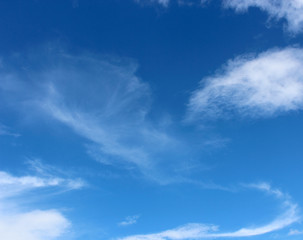 Naklejka na ściany i meble Beautiful white clouds with blue sky background