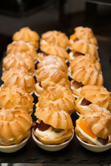  cream puff with whipped cream and fruit