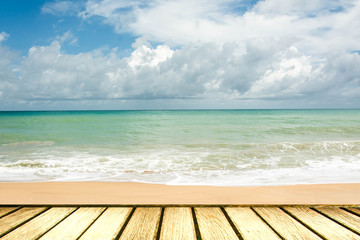 Fototapeta premium wood deck in front of sea landscape. ready for product display. textured image