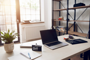 Freelancer desktop with necessary work tools. Startup retoucher and photographer office. Modern technologies, remote working, home employment concept