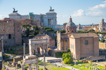 ROME, ITALY - APRIL 8, 2016: Arch of Septimius Severus Roman's forum with ruins of important...