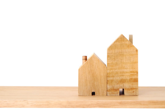 Wooden House Models On Table Isolate On White Background