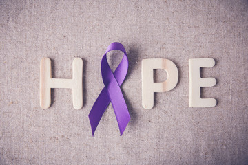 Purple ribbon with HOPE wooden letter, toning, Alzheimer's disease, Pancreatic cancer, Epilepsy awareness, Hodgkin's Lymphoma, domestic violence awareness