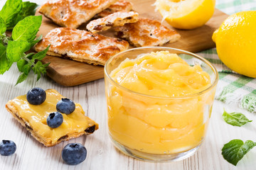 lemon curd in glass cup. blueberry and mint