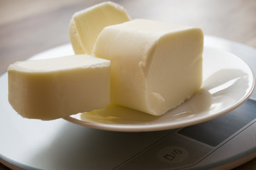 butter blocks on a kitchen scale