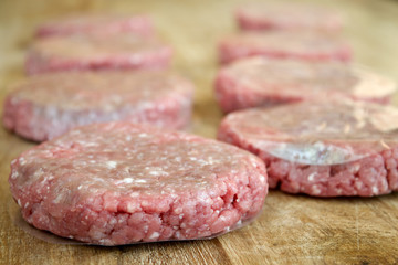 file of raw hamburgers