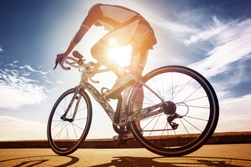 Obraz na płótnie Canvas Cyclist in the sunshine