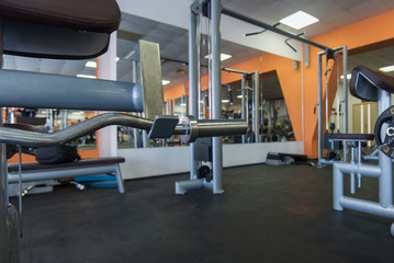 Fototapeta premium Diverse training equipment at the gym room