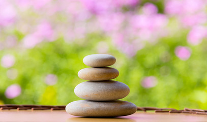 Obraz na płótnie Canvas balancing pebble zen stones outdoor
