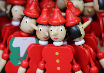 Painted wooden marionette dolls of the figure of Pinocchio