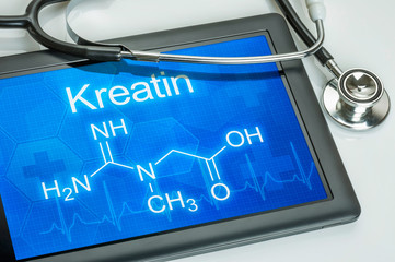 Tablet mit der chemischen Strukturformel von Kreatin