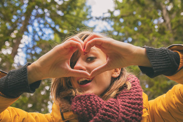 Girl sharing her heart with the nature.