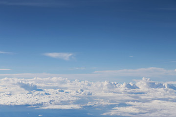 Naklejka na ściany i meble blue sky and white cloud view from the window of an airplane