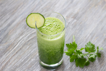 Healthy green cocktail of cucumber and parsley, selective focus