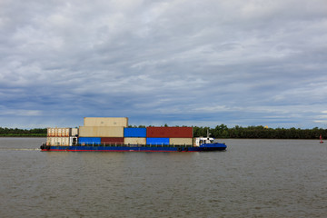 Cargo ship on the river